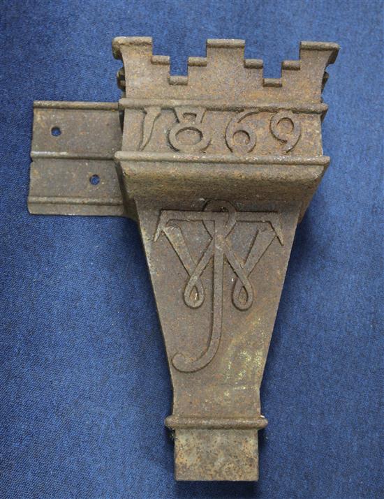 A Victorian gothic cast iron rain hopper, dated 1869,